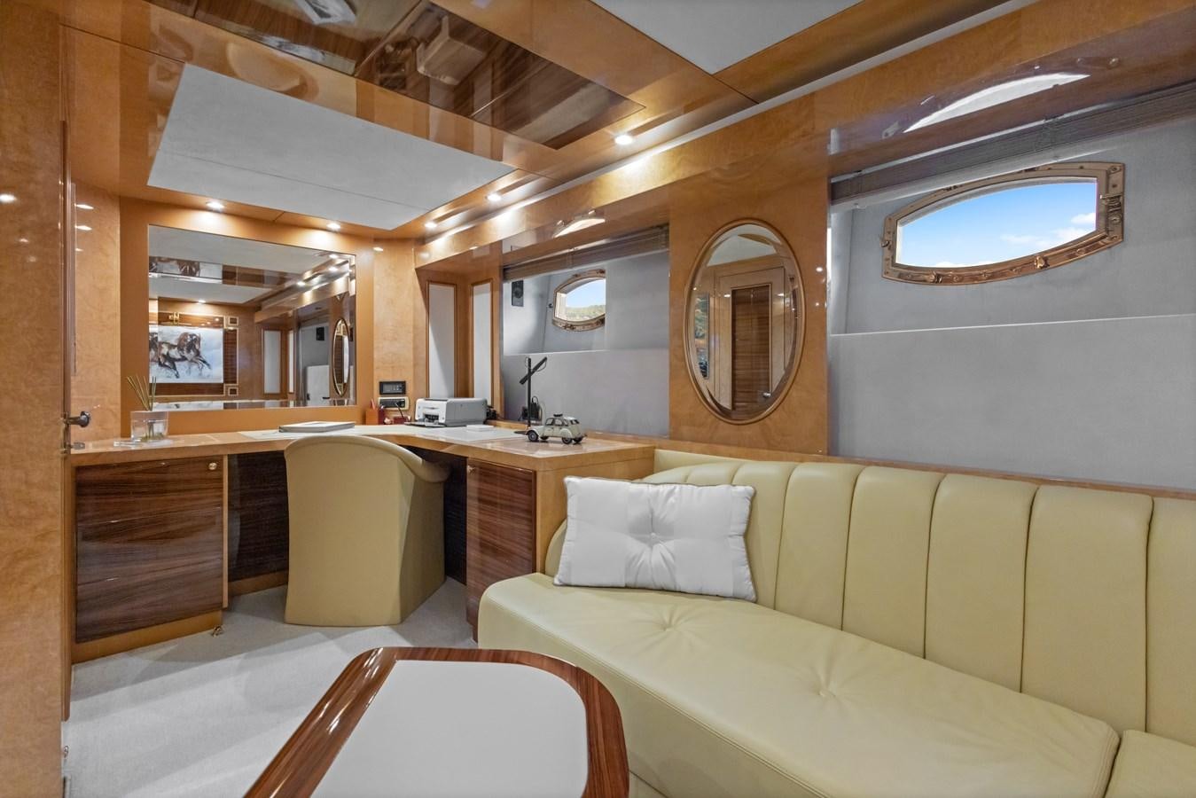 a room with a couch and a table aboard DEBRA ONE Yacht for Sale
