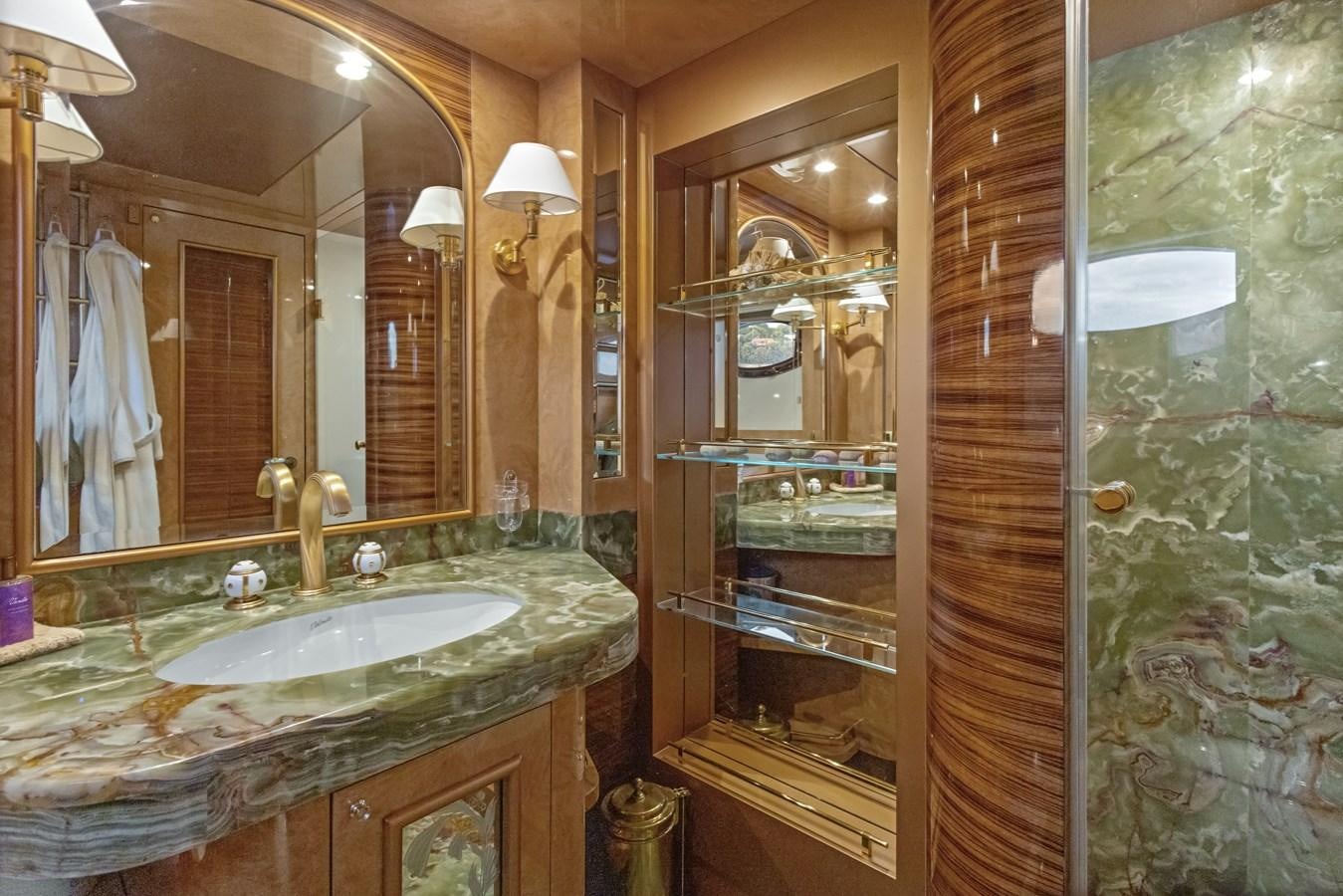a bathroom with a large mirror aboard DEBRA ONE Yacht for Sale