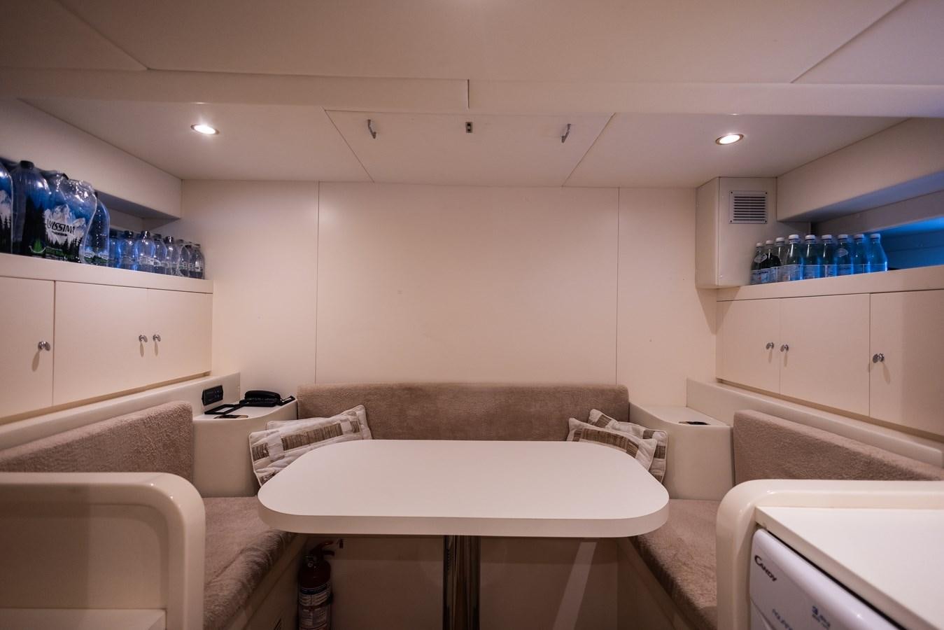 a room with a couch and a table aboard DEBRA ONE Yacht for Sale