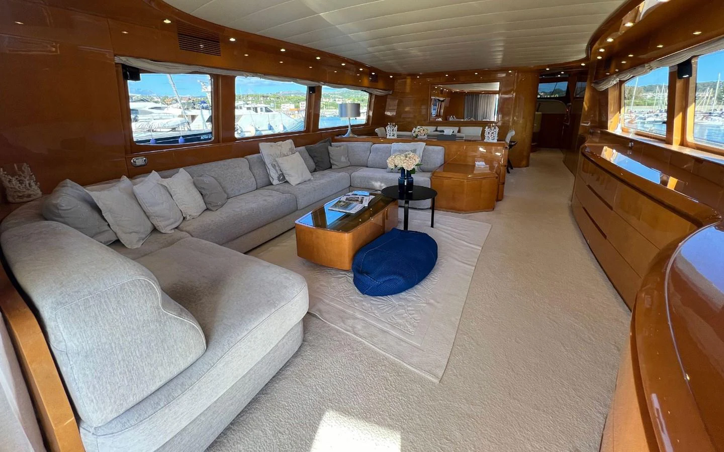 a living room with a couch and a coffee table aboard WILLFUL Yacht for Sale