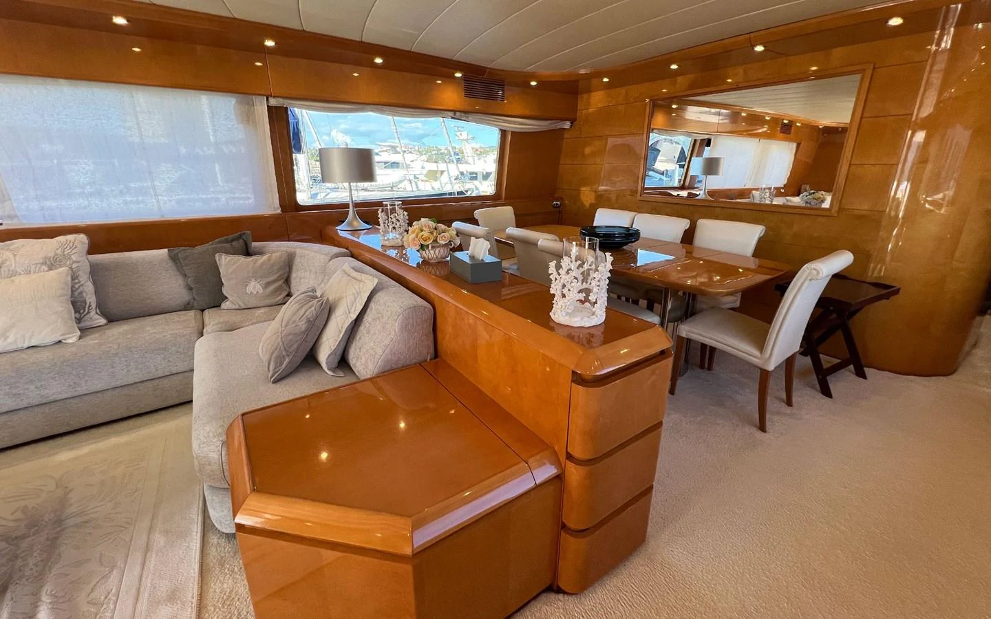 a living room with a couch and a coffee table aboard WILLFUL Yacht for Sale