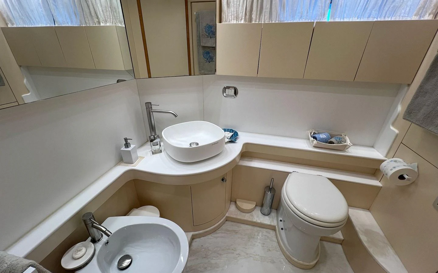 a bathroom with a sink toilet and a bathtub aboard WILLFUL Yacht for Sale