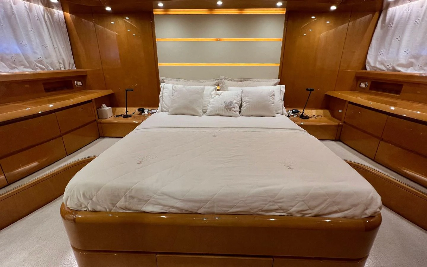 a bed with white sheets aboard WILLFUL Yacht for Sale