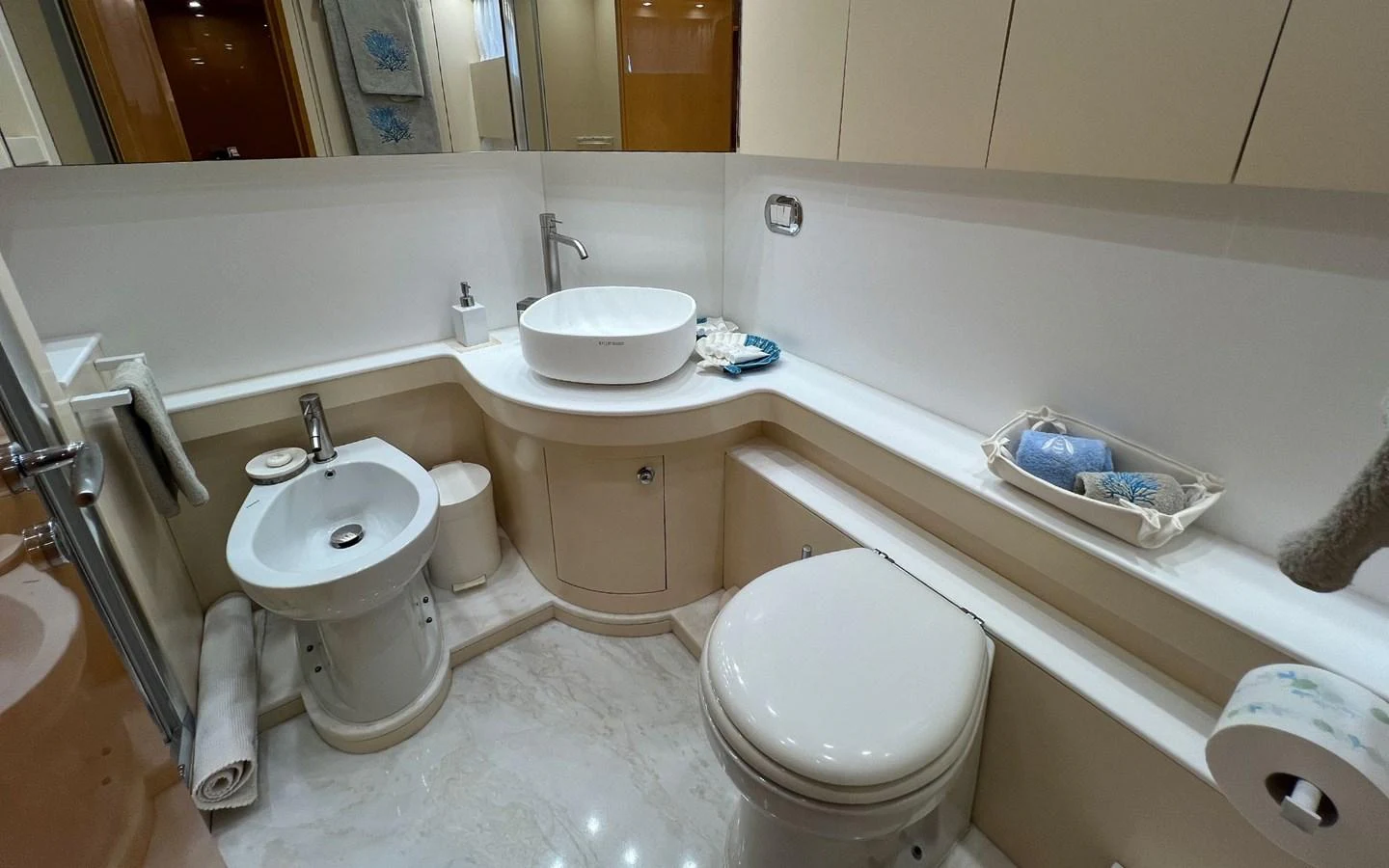 a bathroom with a tub sink and toilet aboard WILLFUL Yacht for Sale