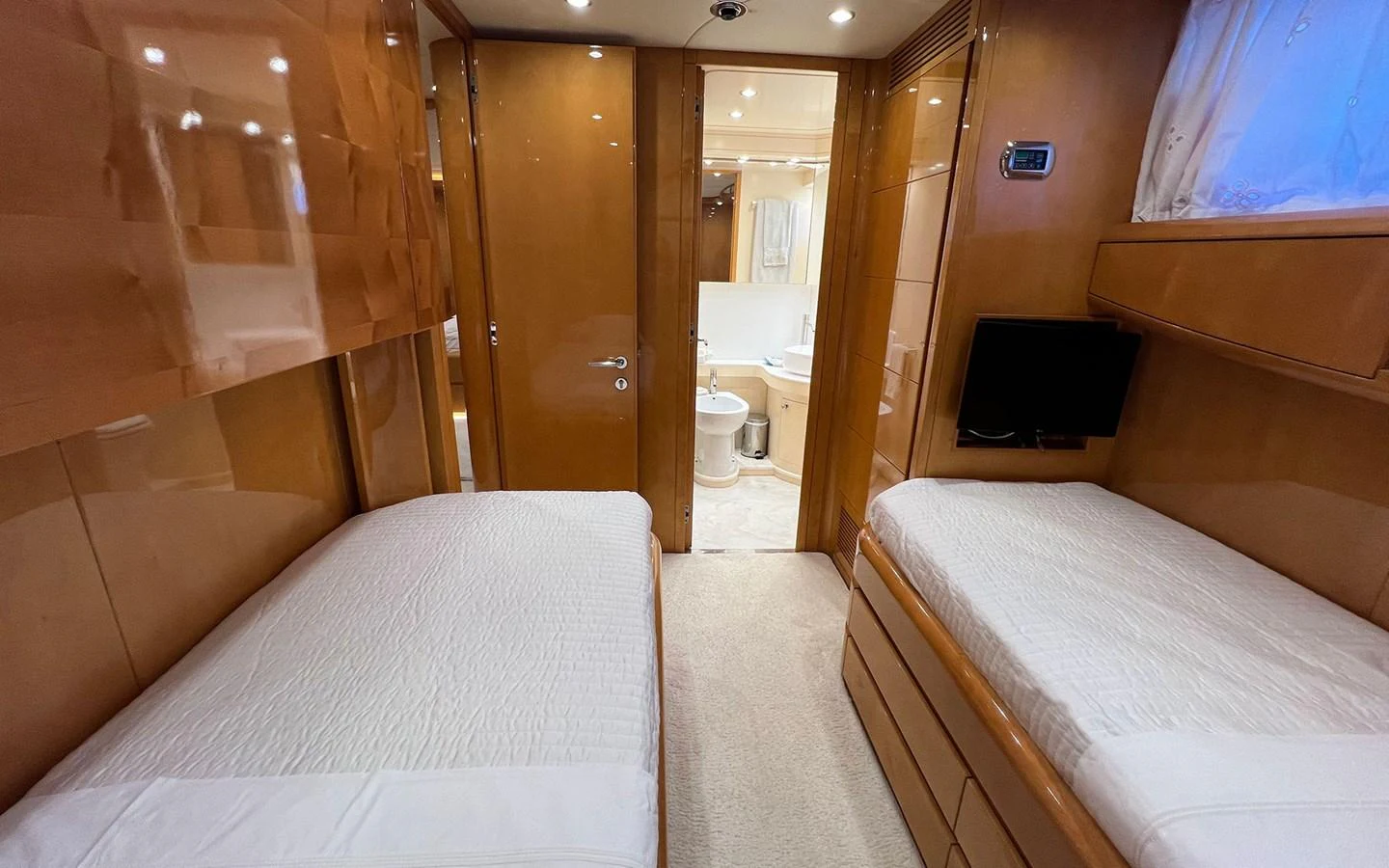 a room with a bed and a television aboard WILLFUL Yacht for Sale