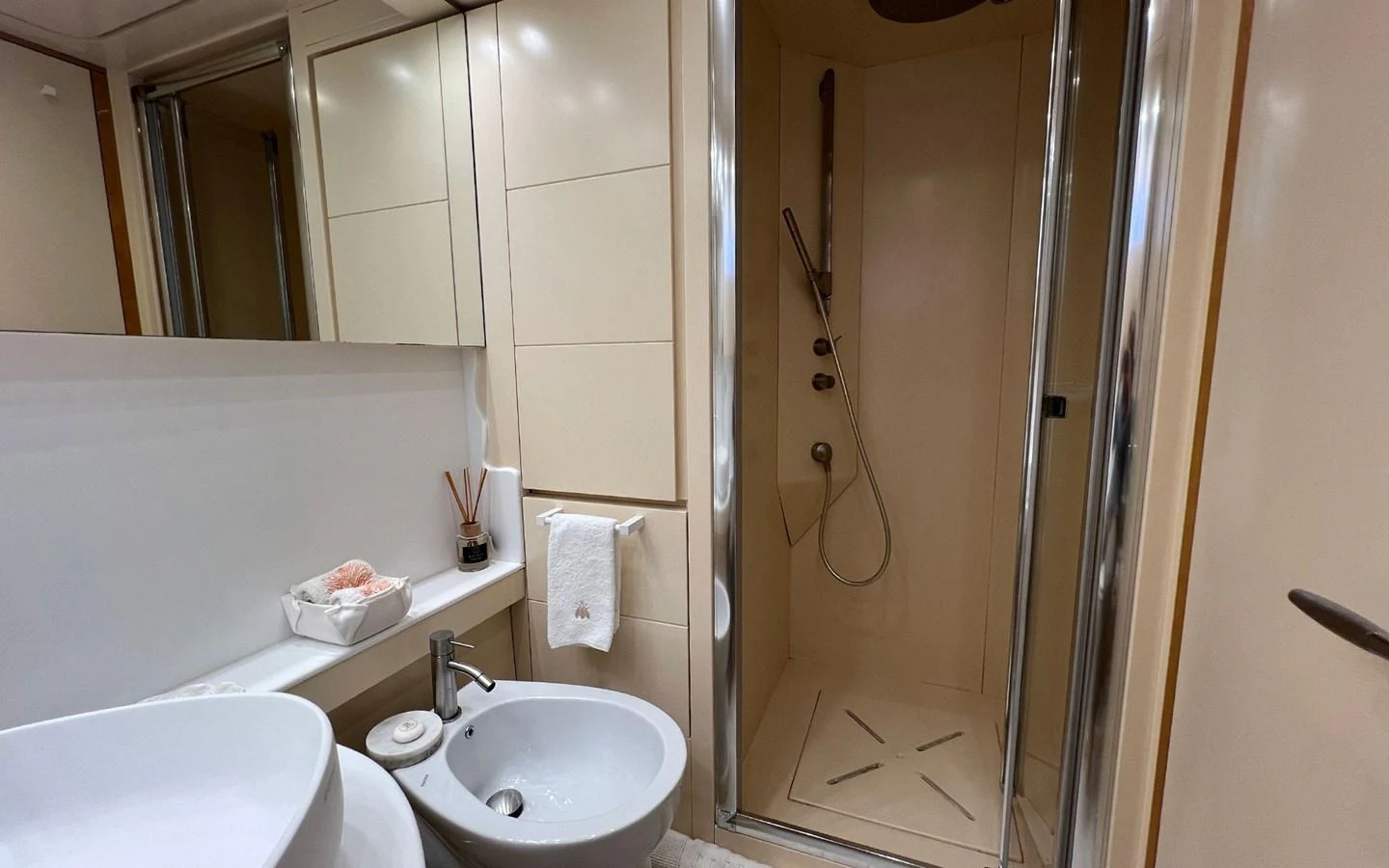 a bathroom with a sink and shower aboard WILLFUL Yacht for Sale