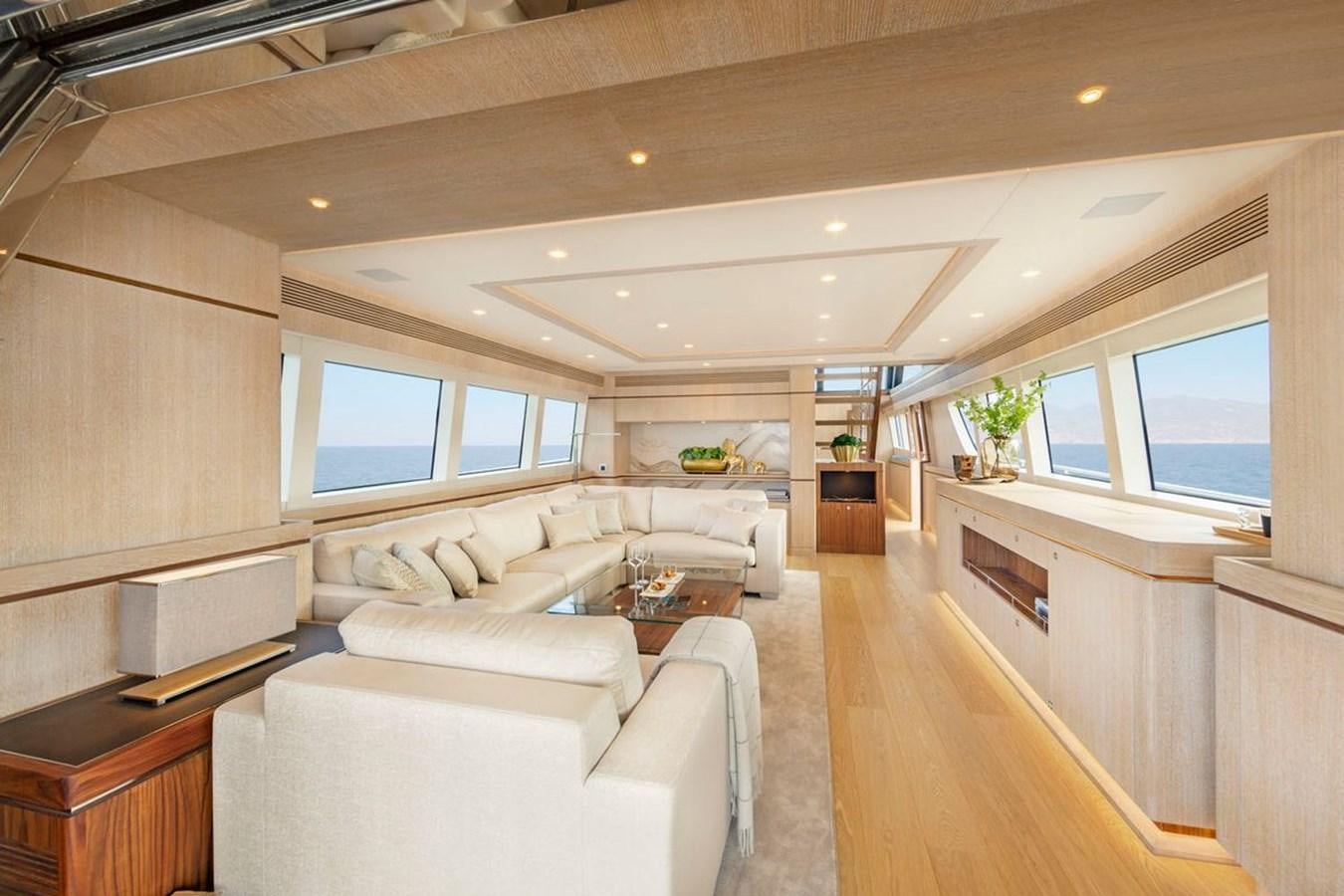 a living room with a large window aboard HELGA Yacht for Sale