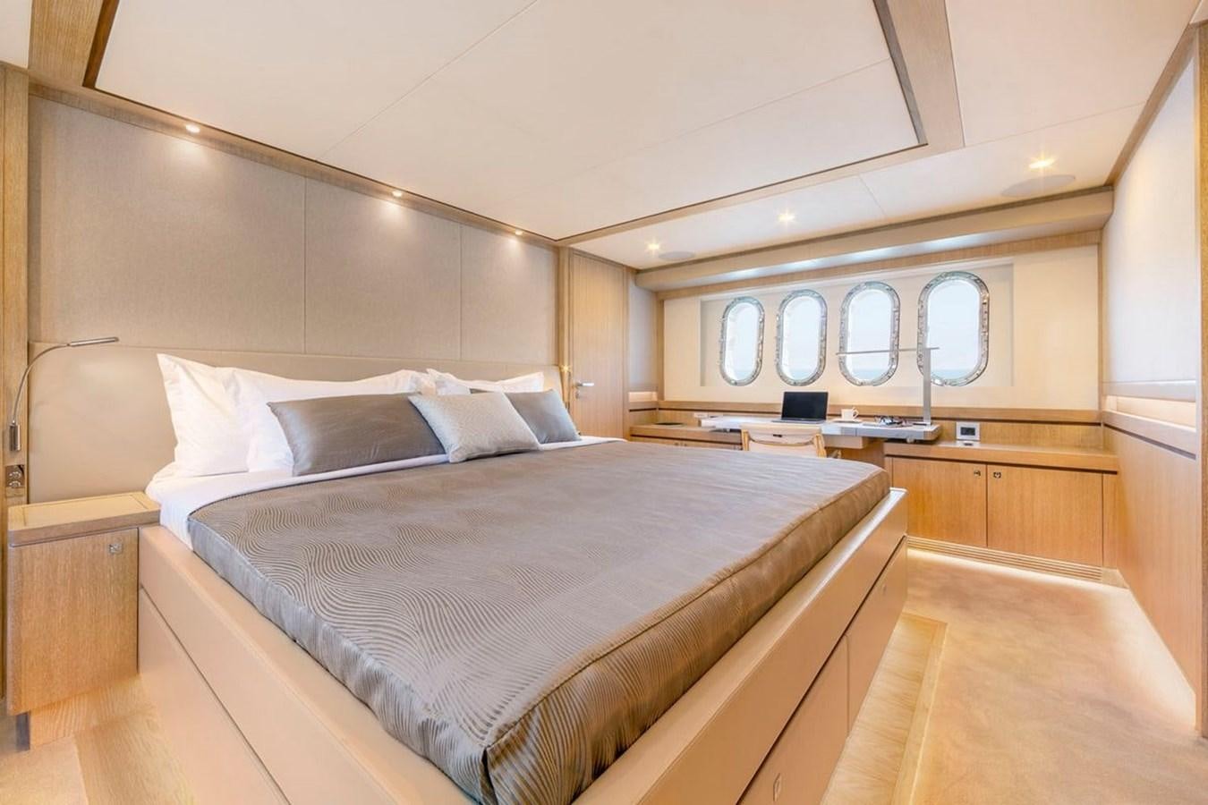 a large bed in a room aboard HELGA Yacht for Sale