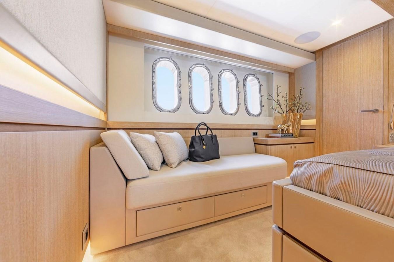a room with a bed and a bag aboard HELGA Yacht for Sale