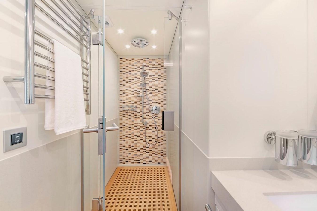 a bathroom with a shower aboard HELGA Yacht for Sale