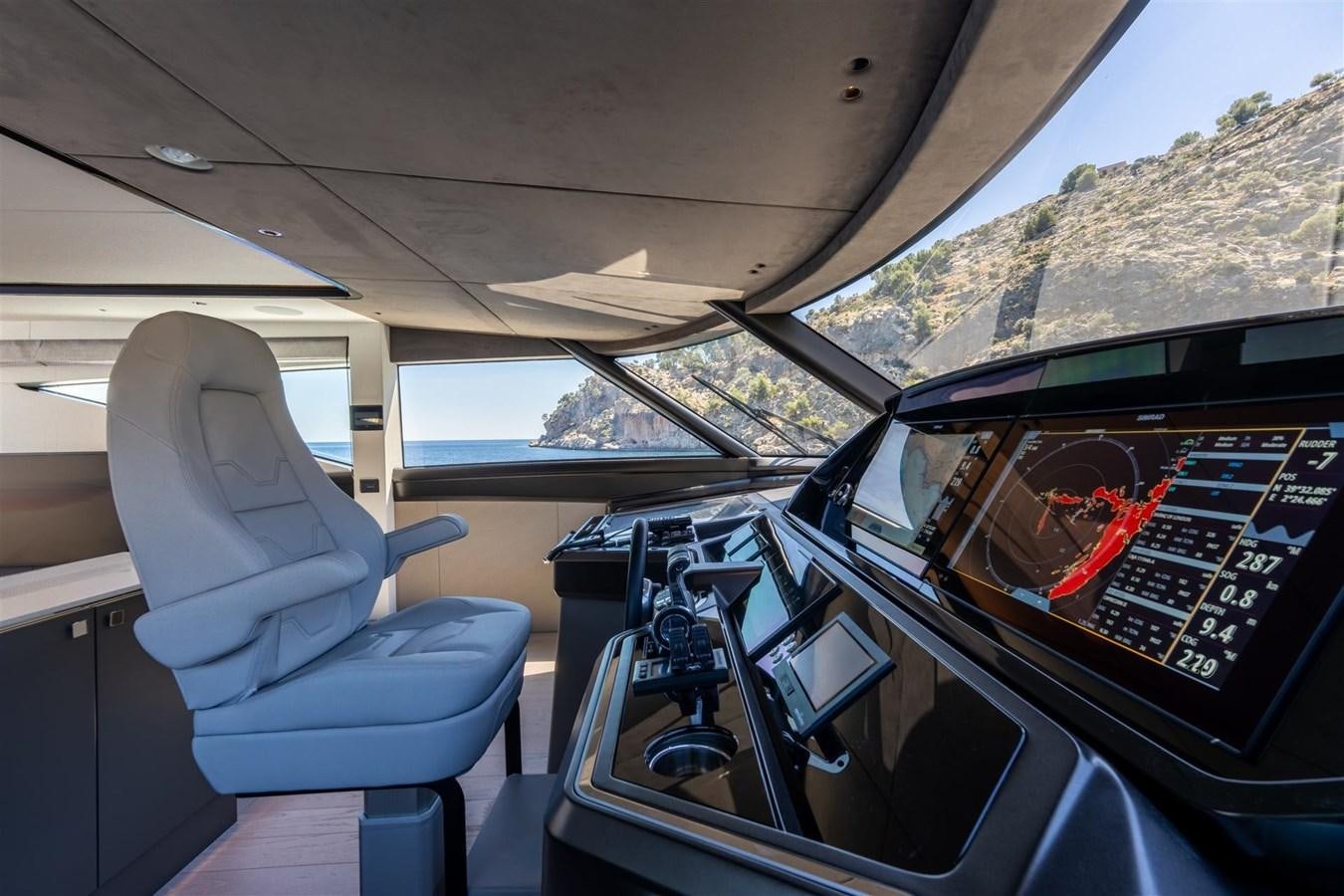 the inside of a car aboard OCEAN 182 Yacht for Sale
