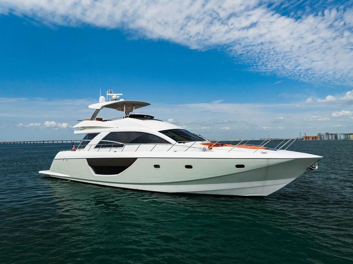 a white yacht in the water aboard KNOT GUILTY Yacht for Sale