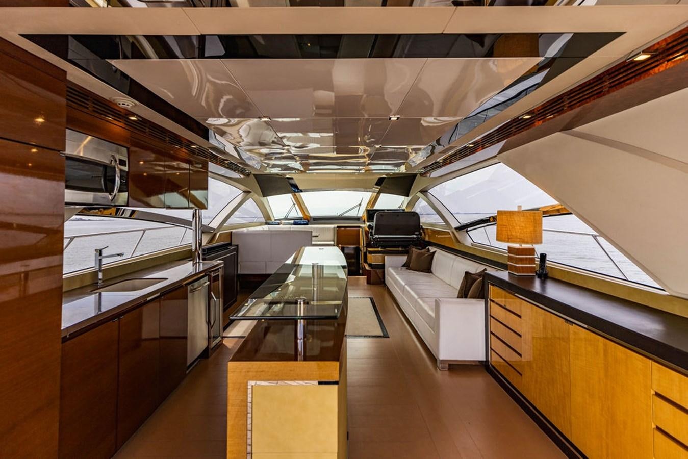 a room with several desks and chairs aboard KNOT GUILTY Yacht for Sale