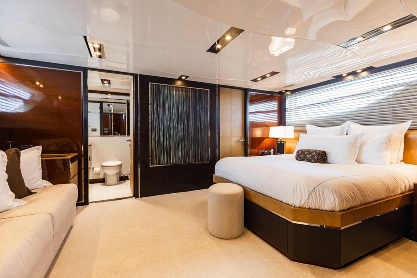 a large bedroom with a large bed aboard KNOT GUILTY Yacht for Sale