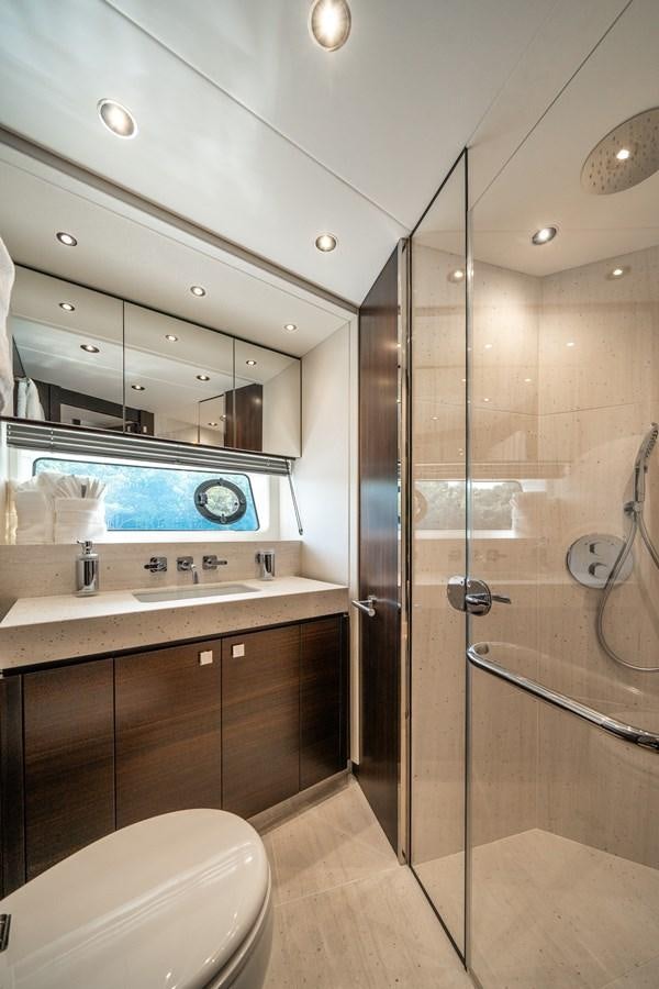 a bathroom with a glass shower aboard 88 YACHT Yacht for Sale