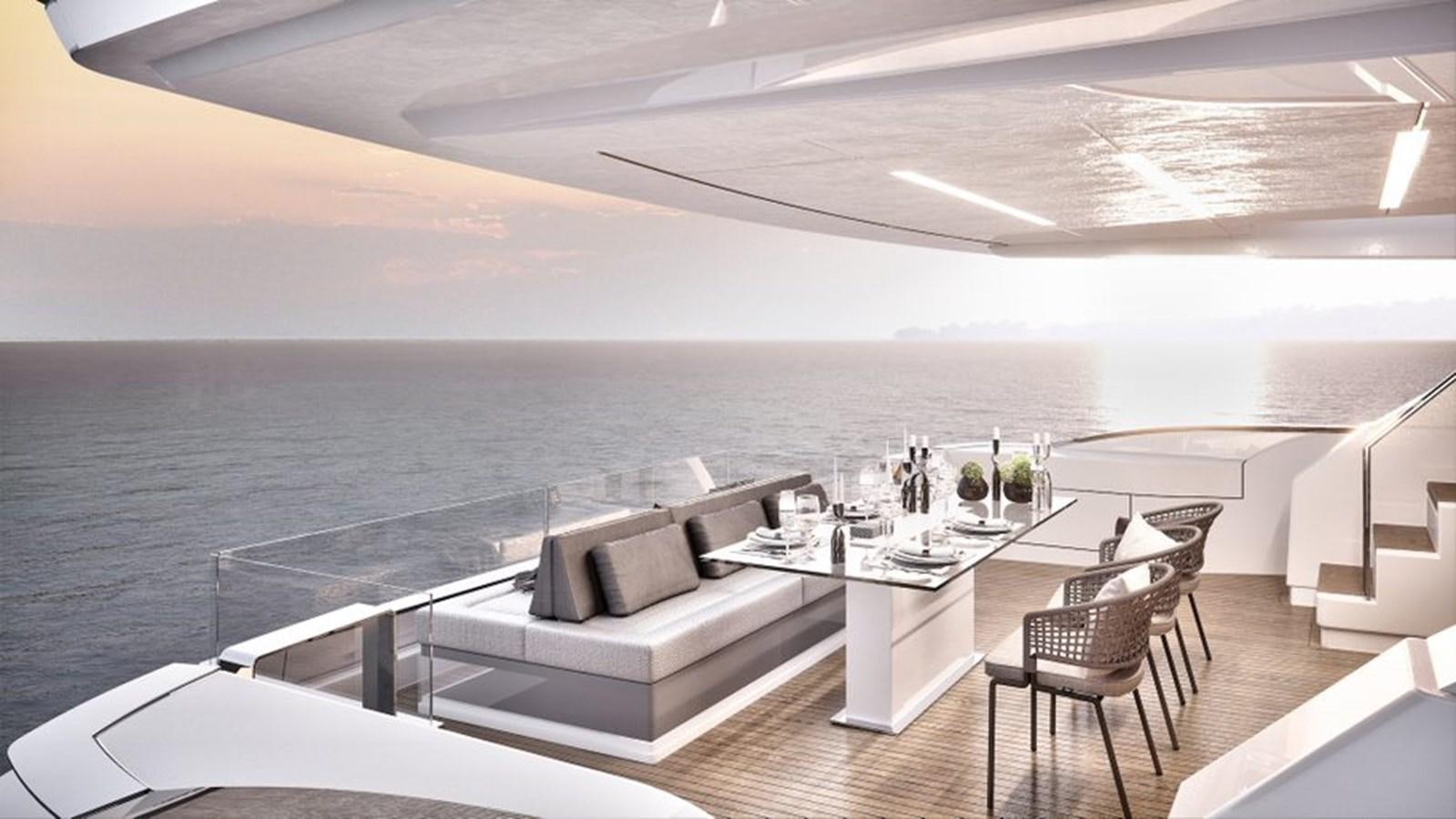 a room with a couch and a table and chairs aboard L88 Yacht for Sale