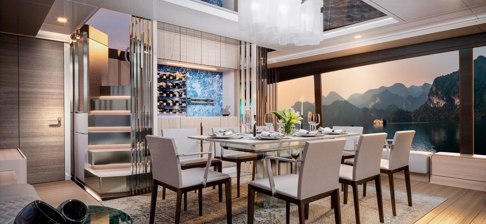 a room with a table and chairs aboard L88 Yacht for Sale