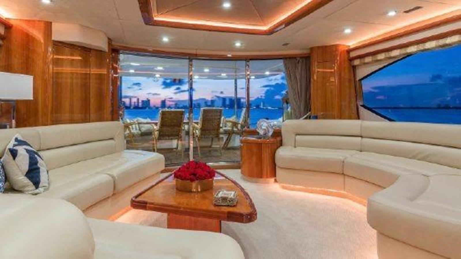 a living room with a large window aboard ACQUA ALBERTI Yacht for Sale