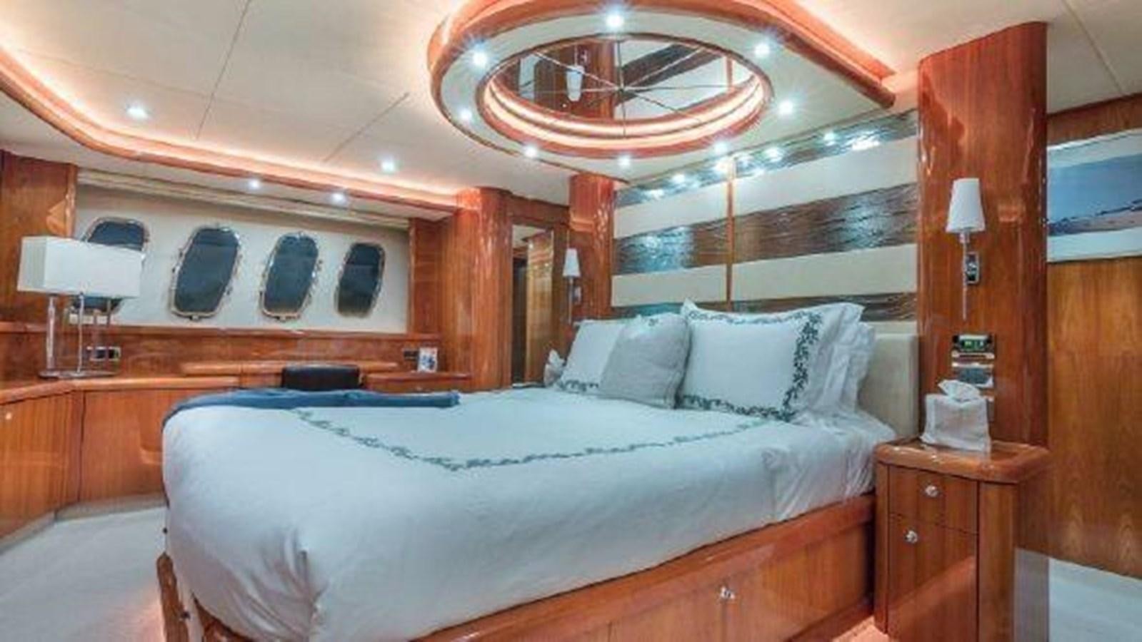 a bed in a room aboard ACQUA ALBERTI Yacht for Sale