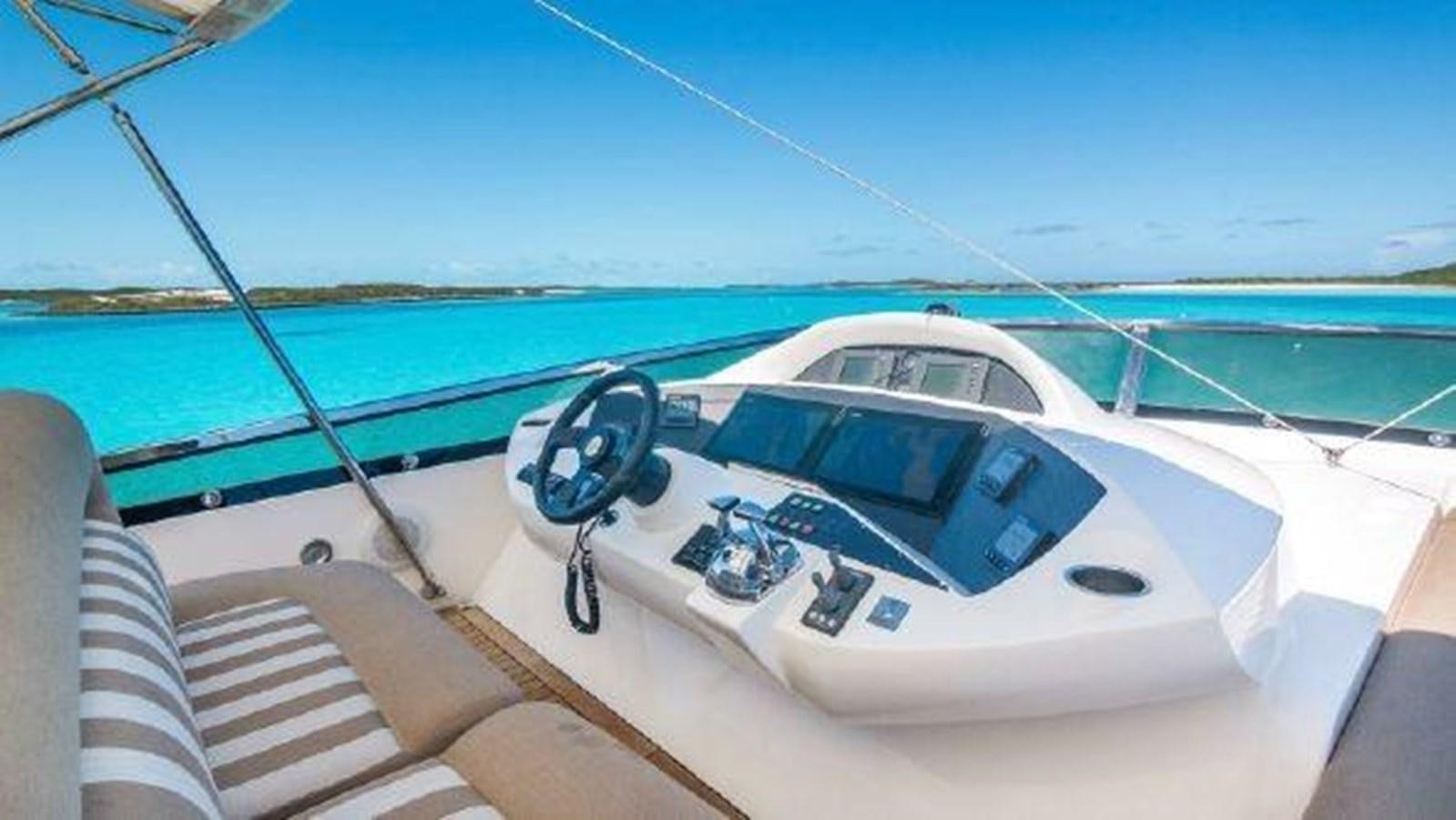 a white car on a boat aboard ACQUA ALBERTI Yacht for Sale