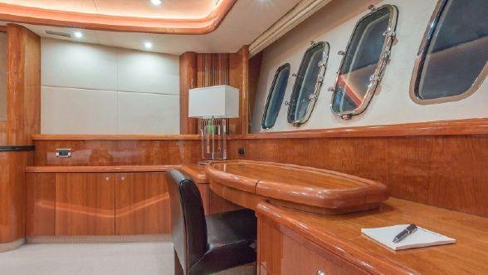 a room with a desk and chairs aboard ACQUA ALBERTI Yacht for Sale