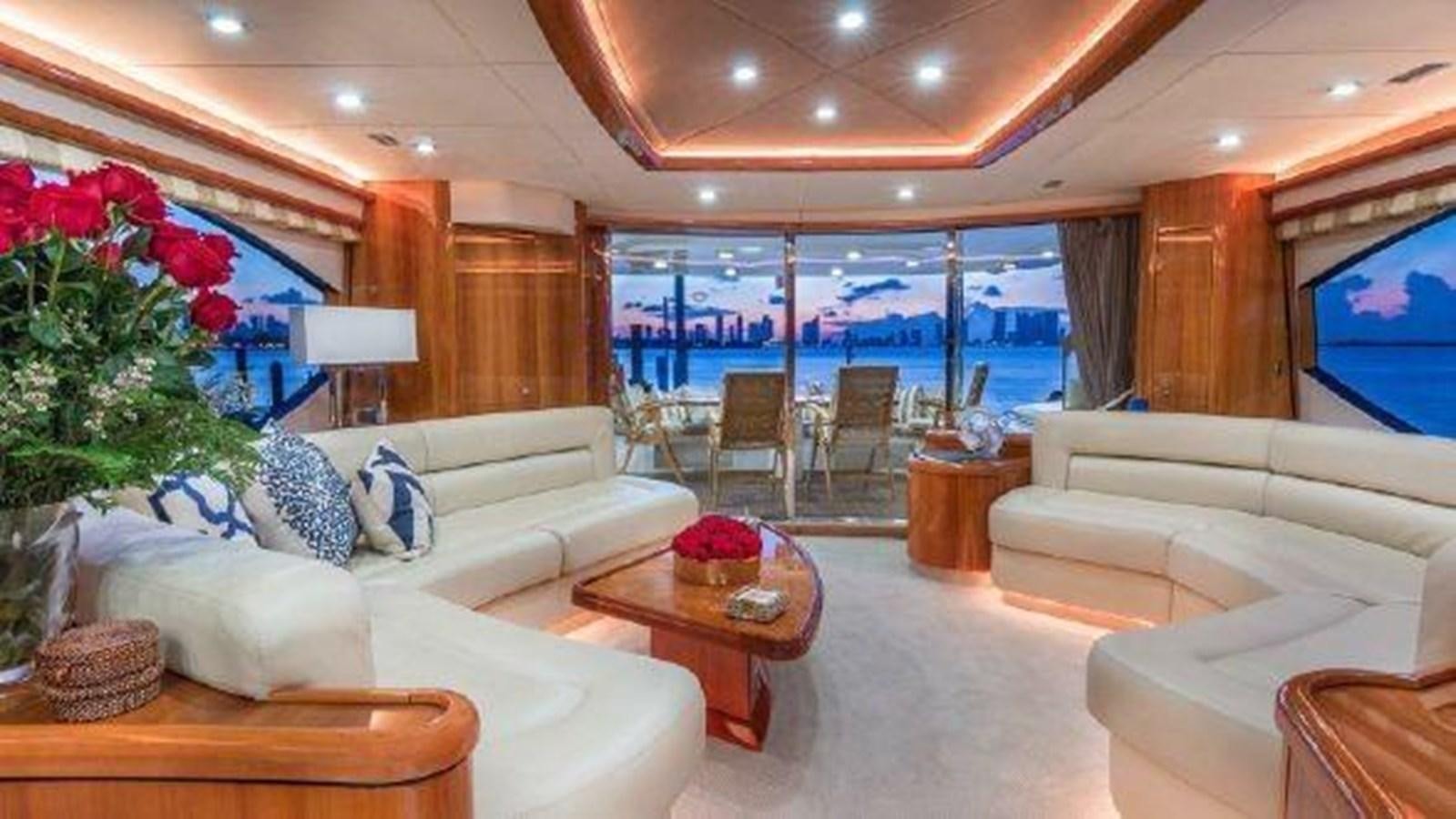 a living room with a large window aboard ACQUA ALBERTI Yacht for Sale