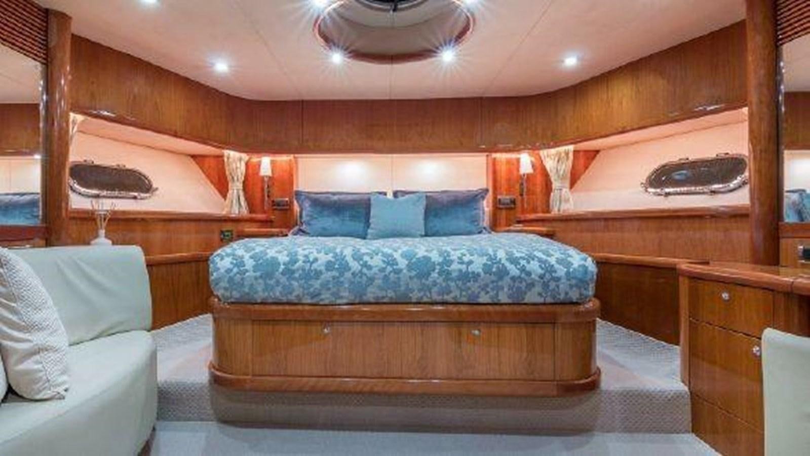 a bed in a room aboard ACQUA ALBERTI Yacht for Sale