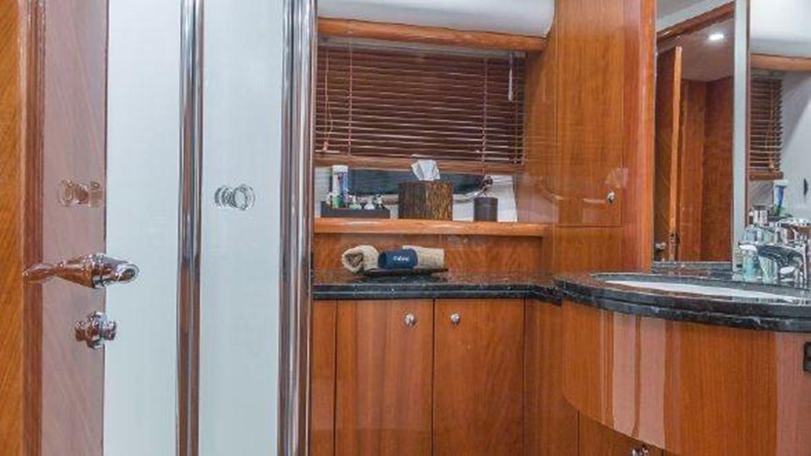 a kitchen with a white door aboard ACQUA ALBERTI Yacht for Sale