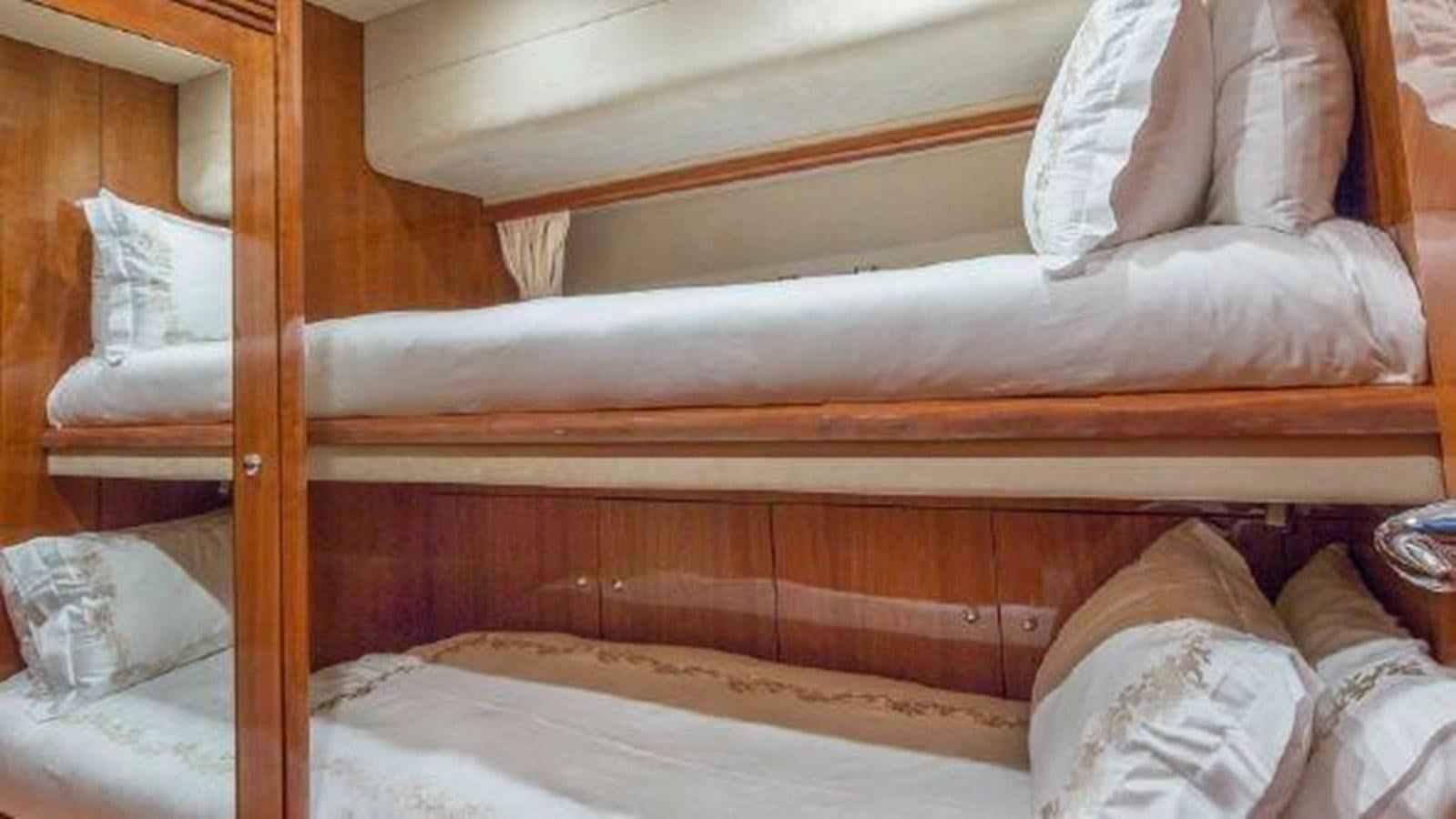 a bed with white sheets aboard ACQUA ALBERTI Yacht for Sale