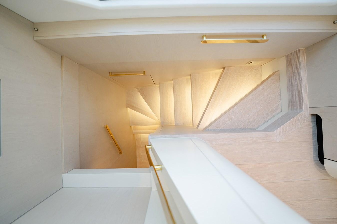 a room with white walls aboard TRANSCENDENCE Yacht for Sale