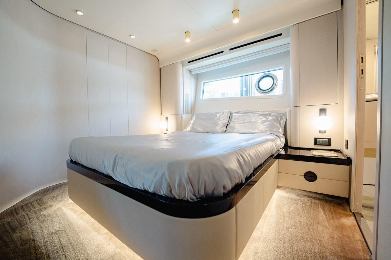 a bed in a room aboard TRANSCENDENCE Yacht for Sale