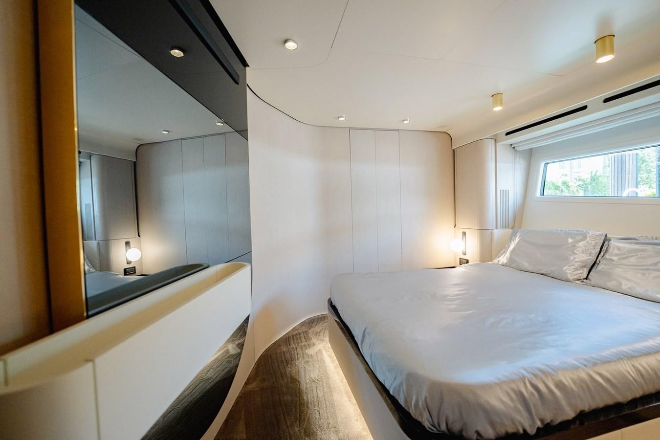 a room with two beds aboard TRANSCENDENCE Yacht for Sale