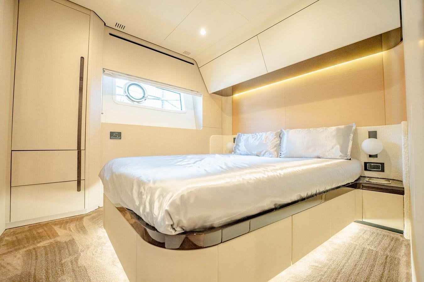 a bed in a room aboard TRANSCENDENCE Yacht for Sale
