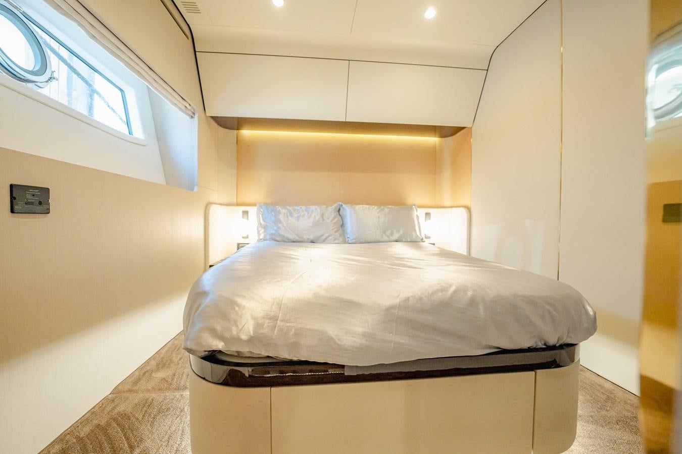 a bed in a room aboard TRANSCENDENCE Yacht for Sale