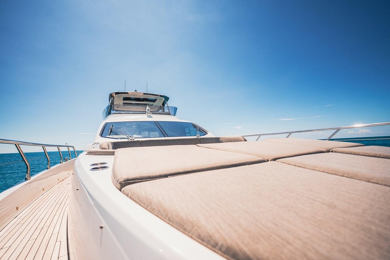 a boat on a beach aboard TRANSCENDENCE Yacht for Sale