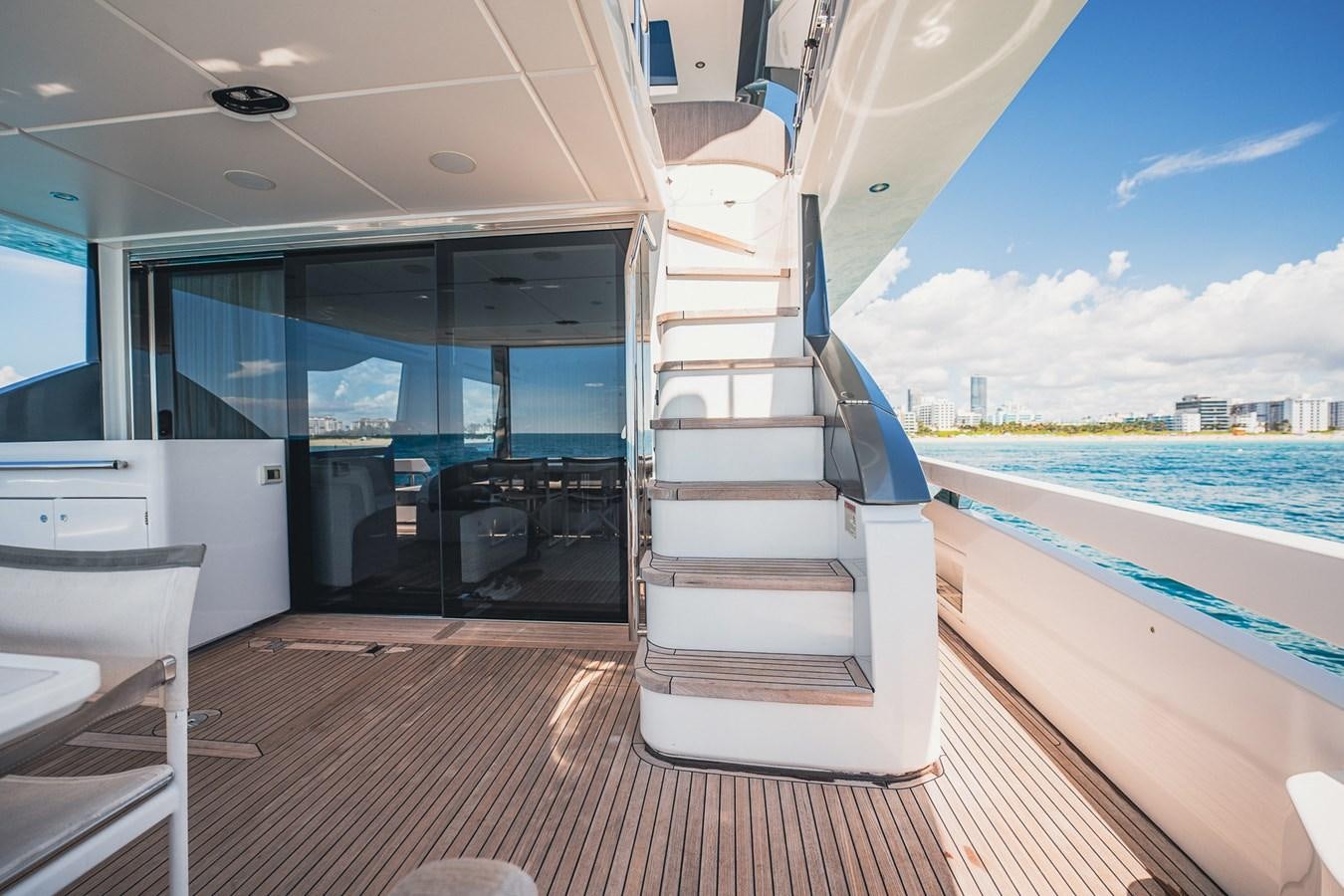 a boat on a deck aboard TRANSCENDENCE Yacht for Sale
