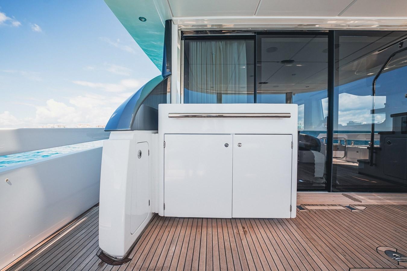 a large white building with a large window aboard TRANSCENDENCE Yacht for Sale