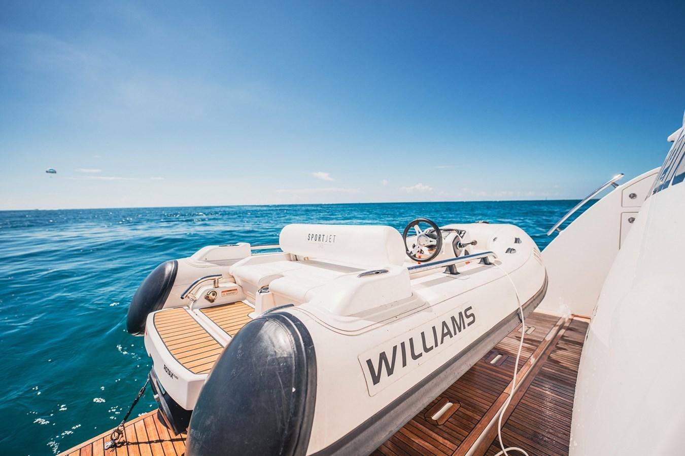 a boat on the water aboard TRANSCENDENCE Yacht for Sale