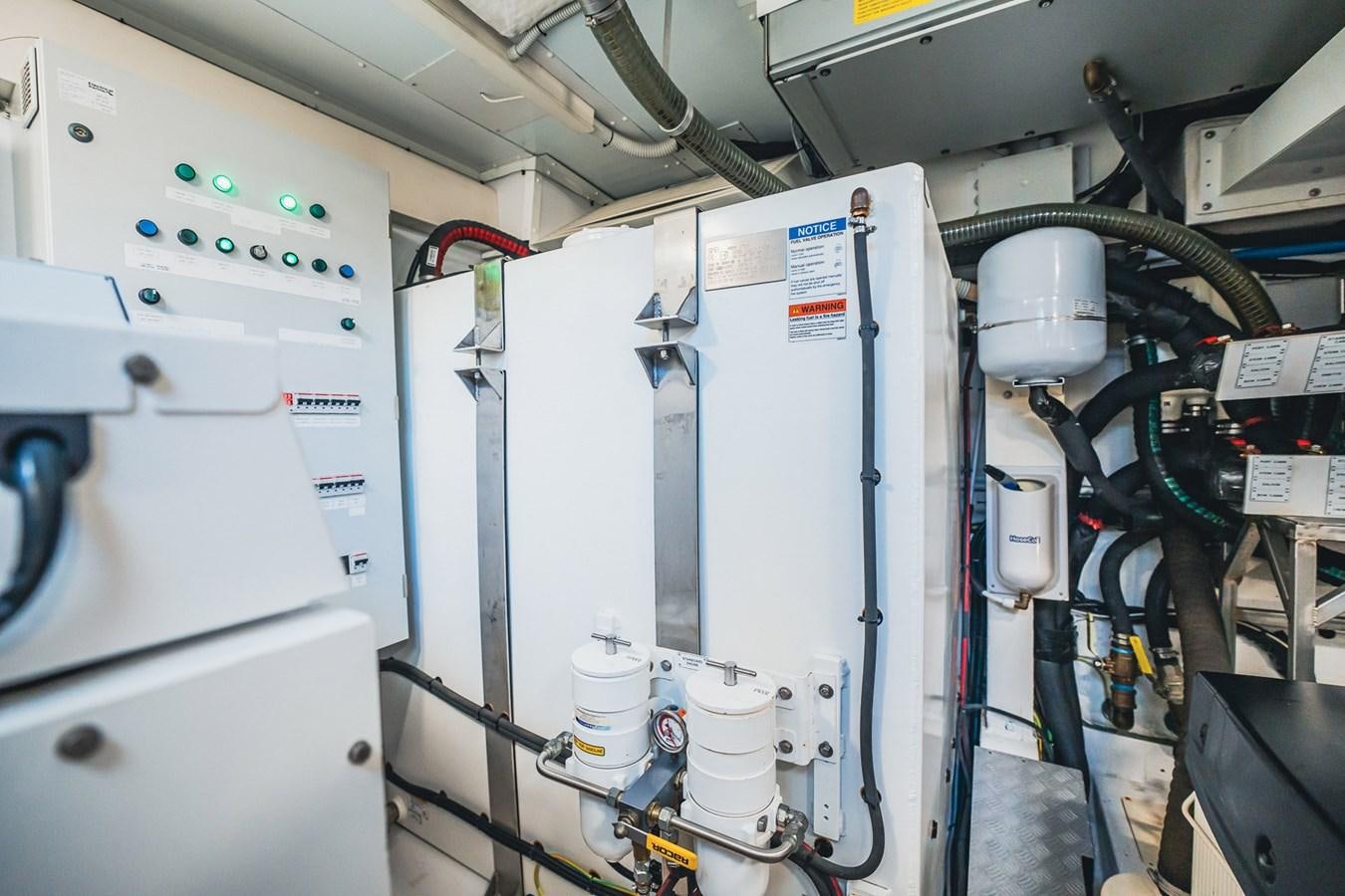 a machine with a large piece of equipment on it aboard TRANSCENDENCE Yacht for Sale