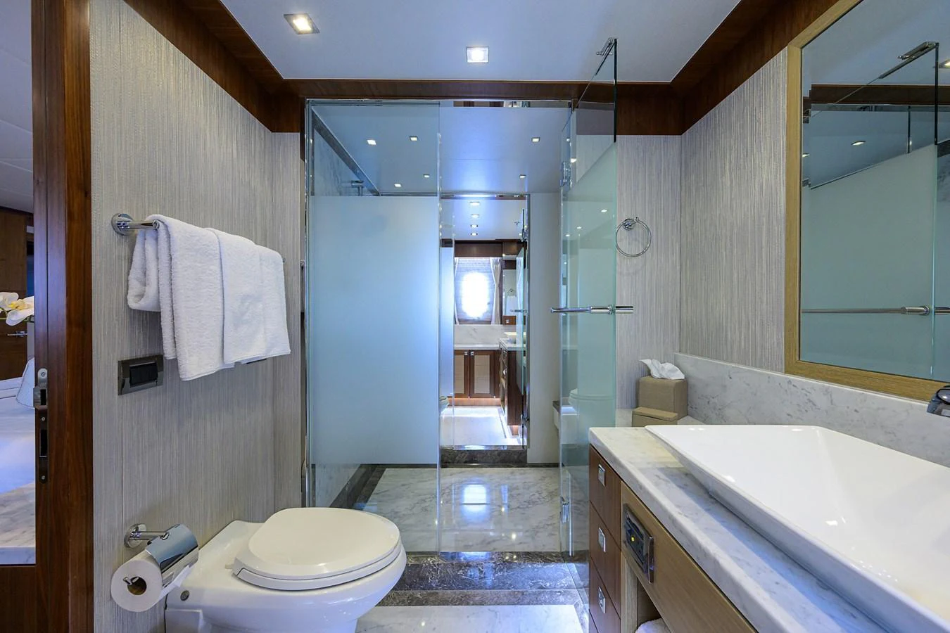 a bathroom with a sink toilet and a shower unit aboard SECOND AMENDMENT Yacht for Sale