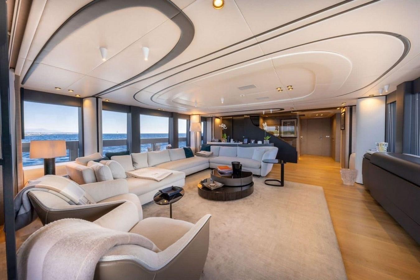 a living room with a large open window aboard MY UILIA Yacht for Sale