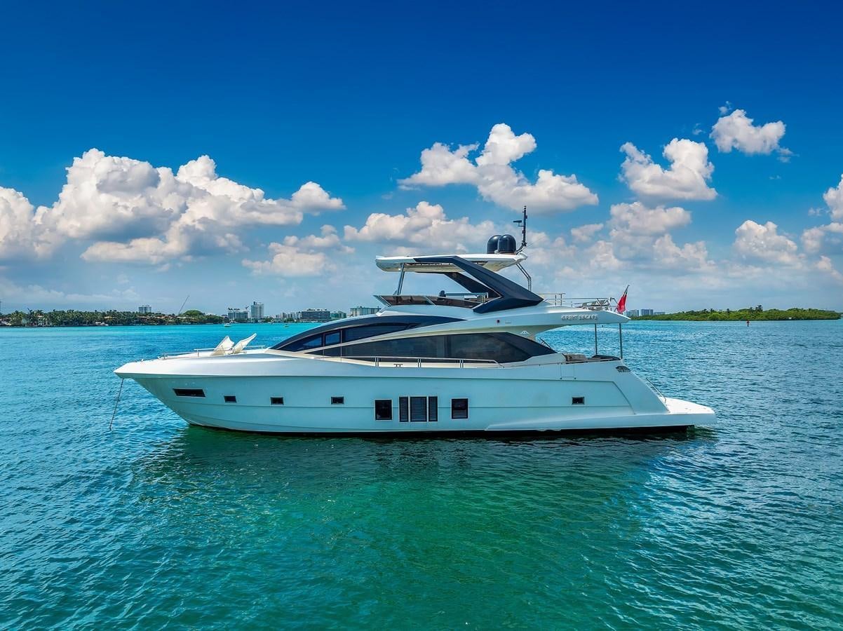 a white boat in the water aboard GREYT ESCAPE Yacht for Sale