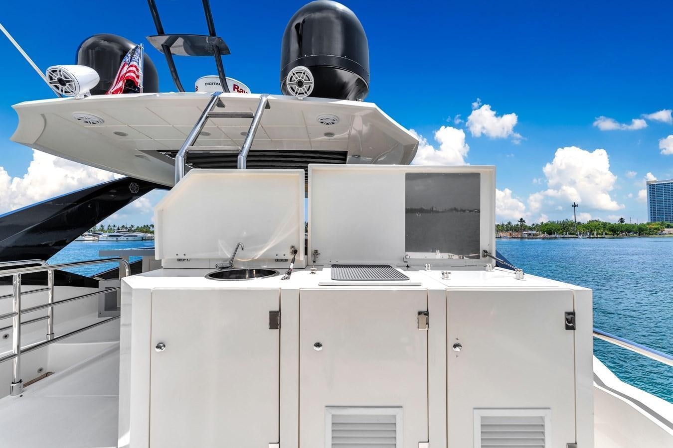 a boat with a helmet on the front aboard GREYT ESCAPE Yacht for Sale