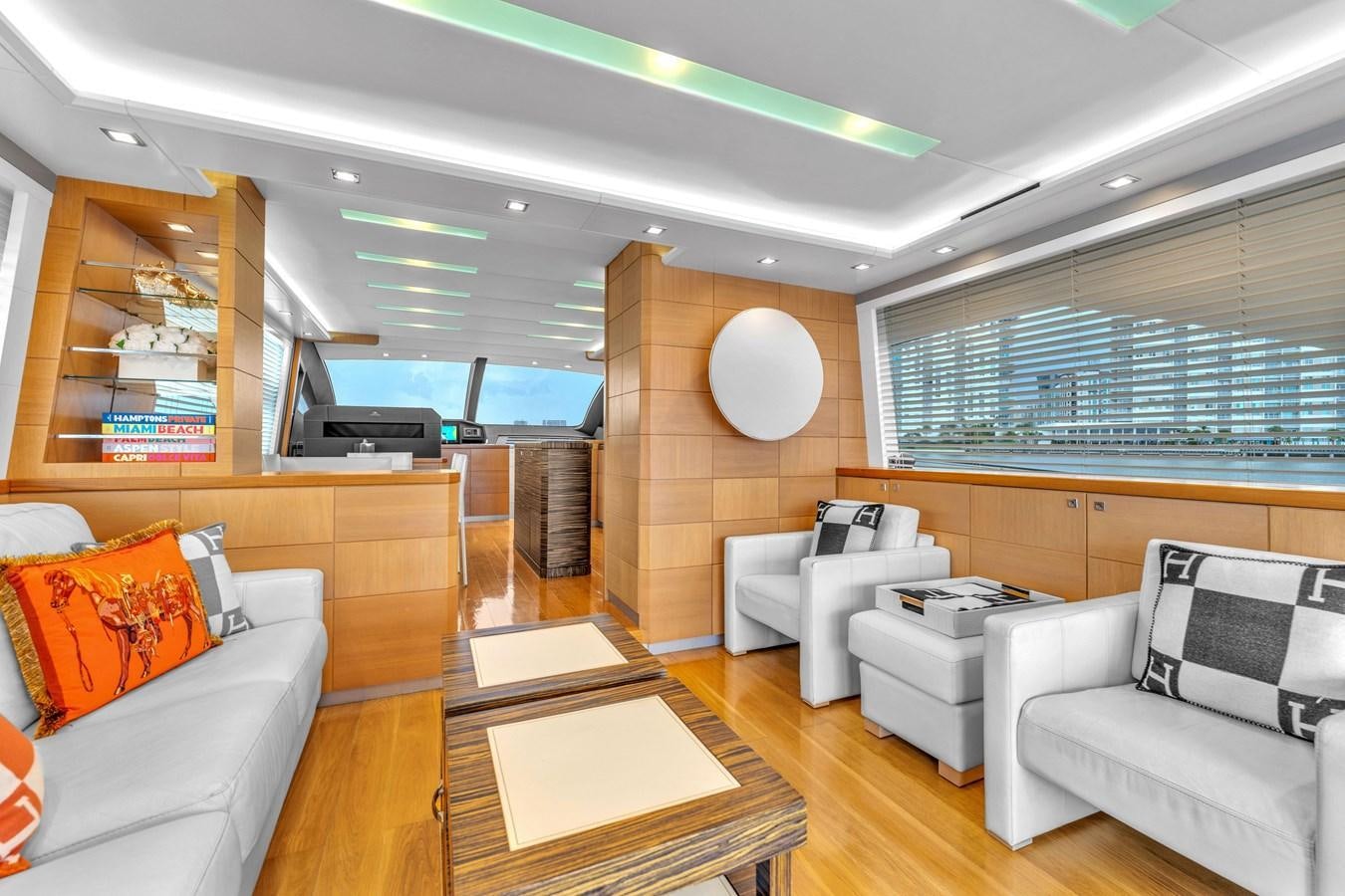 a room with a couch and a table aboard GREYT ESCAPE Yacht for Sale