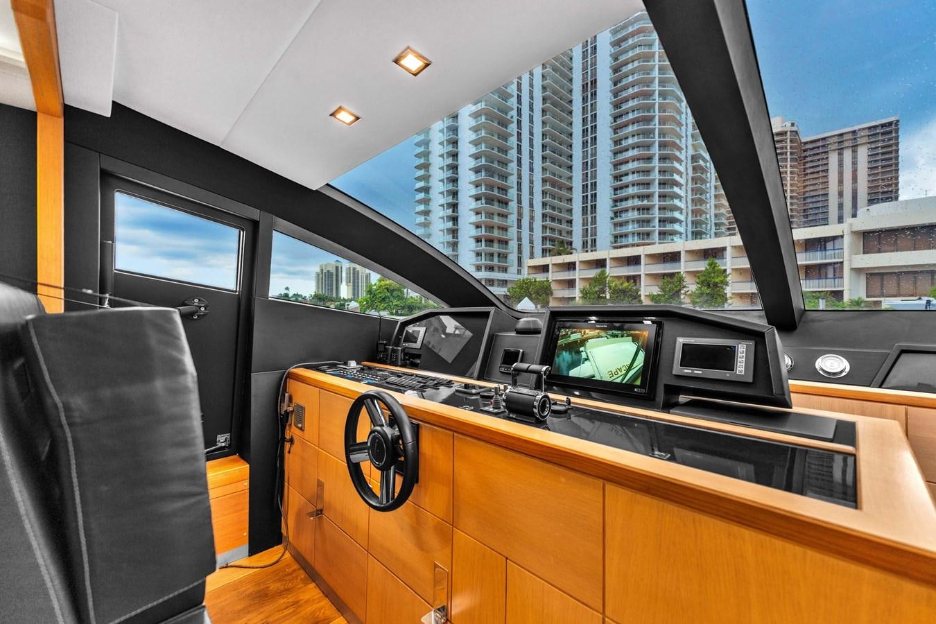inside of a car aboard GREYT ESCAPE Yacht for Sale