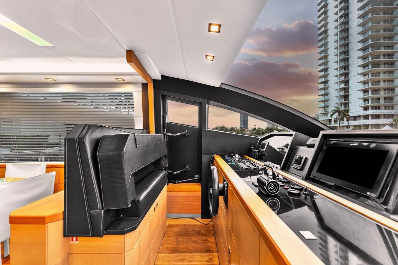 a room with a desk and computers aboard GREYT ESCAPE Yacht for Sale