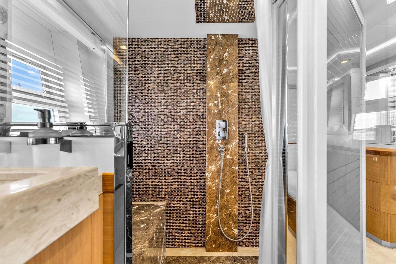 a kitchen with a wall of wires aboard GREYT ESCAPE Yacht for Sale