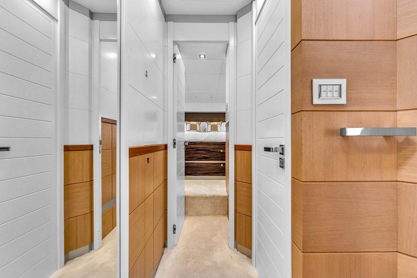 a room with wooden cabinets aboard GREYT ESCAPE Yacht for Sale