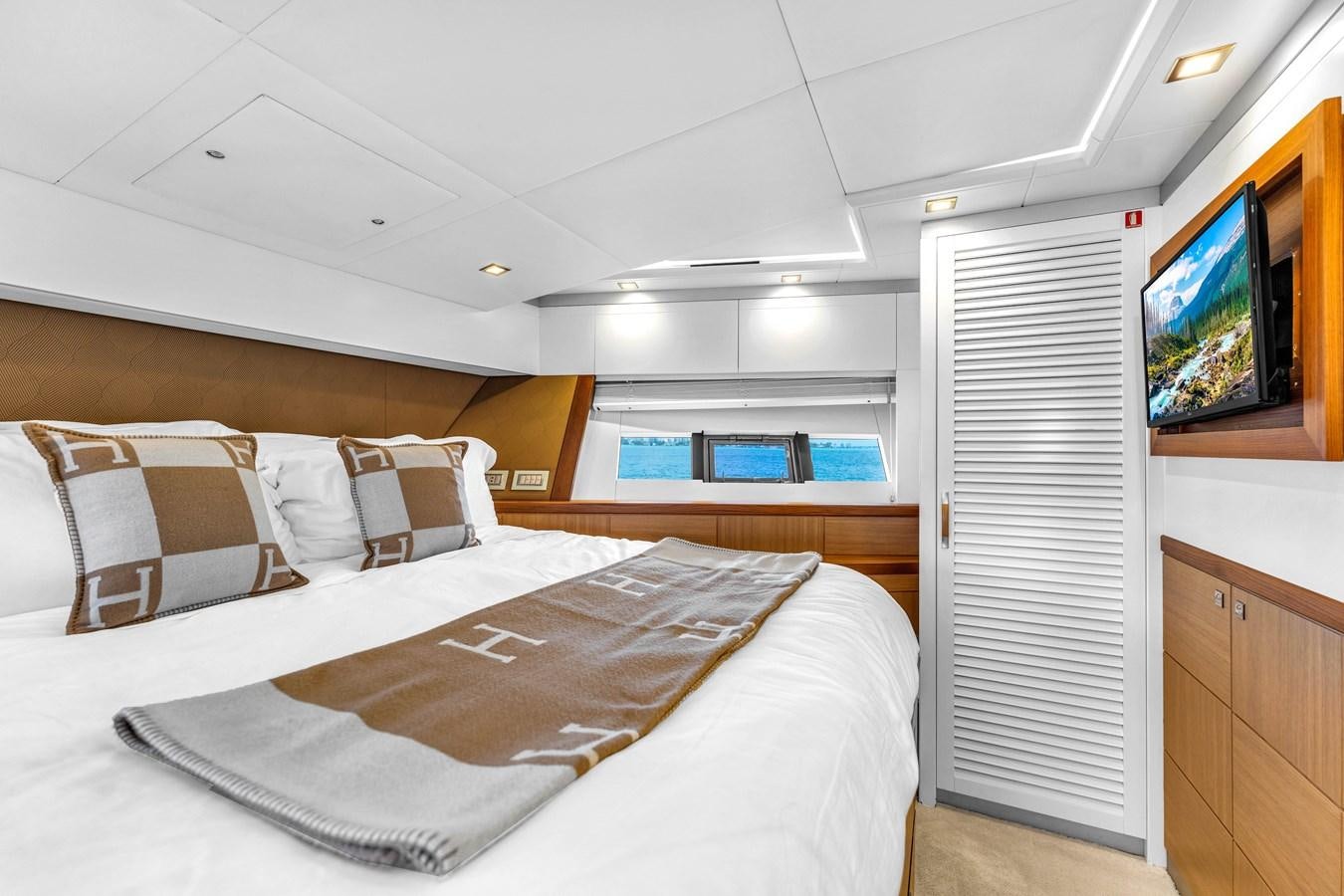 a bed in a room aboard GREYT ESCAPE Yacht for Sale