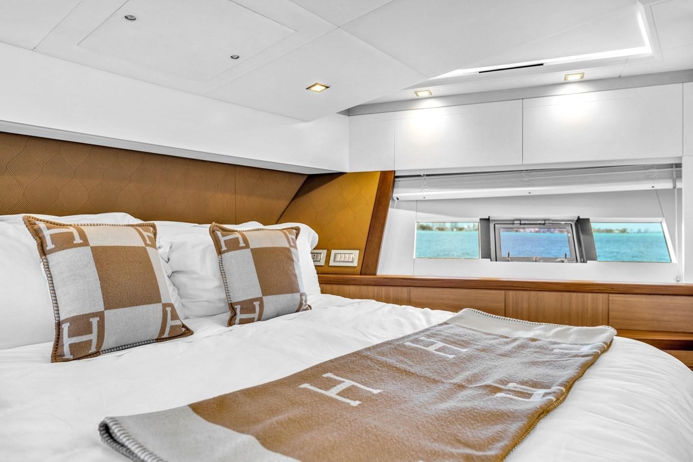 a bed with pillows aboard GREYT ESCAPE Yacht for Sale